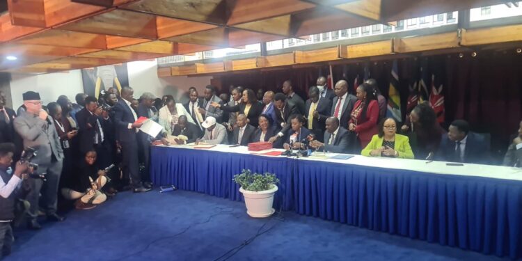 KMPDU Officials and Government Officials after signing an agreement. PHOTO/ Gabriel Muthuma