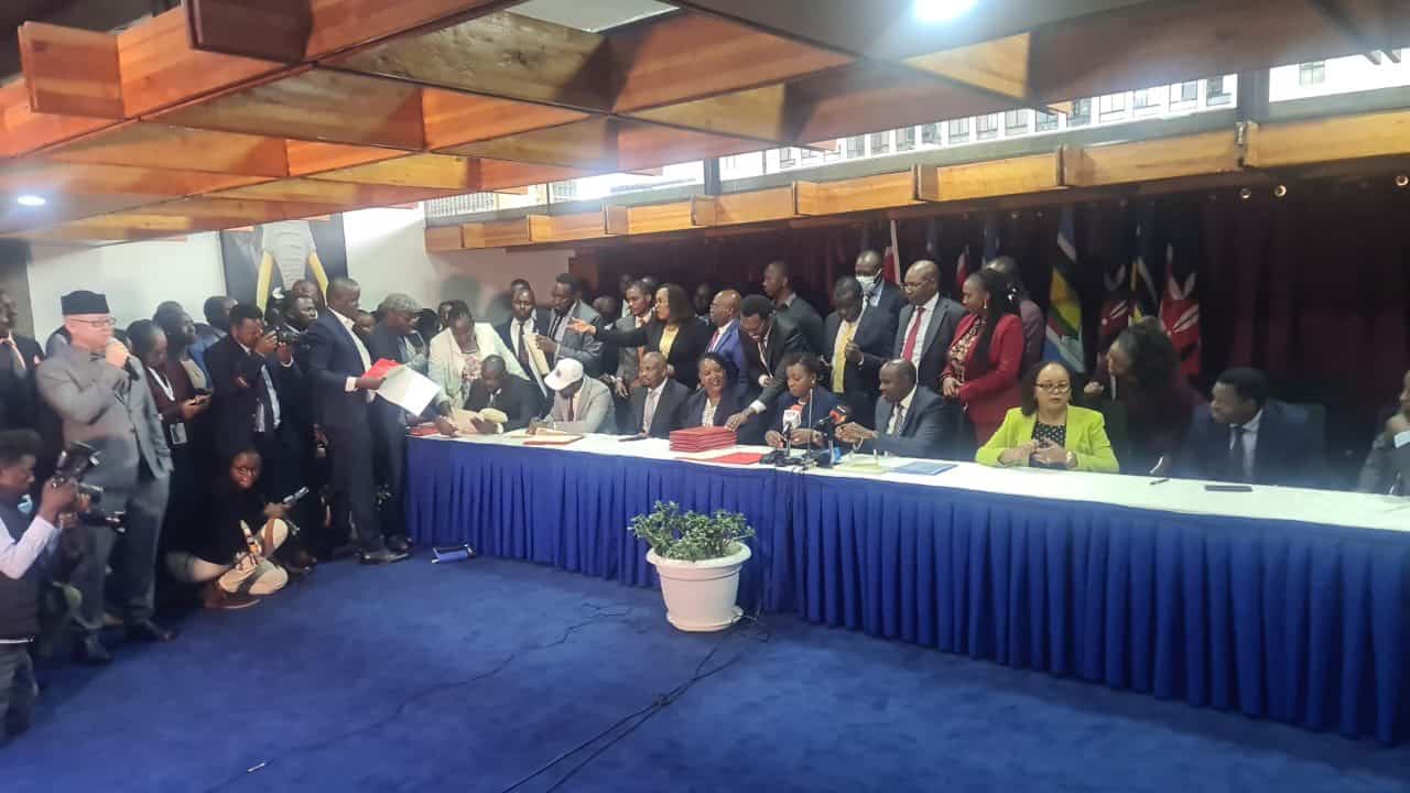 KMPDU Officials and Government Officials after signing an agreement. PHOTO/ Gabriel Muthuma