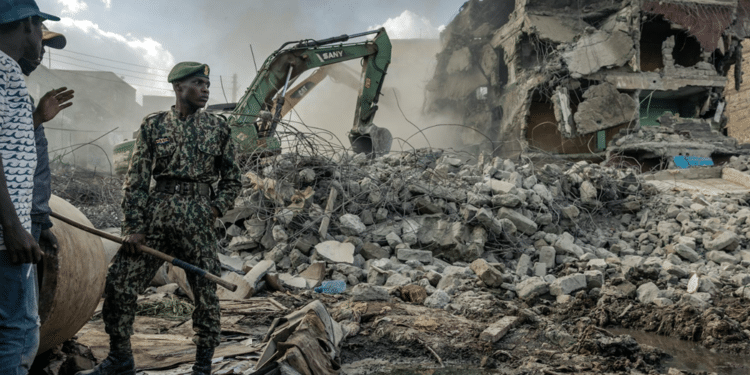 A building under demolition in the Mathare informal settlement of Nairobi, Kenya. Photo by LUIS TATO/AFP via Getty Images