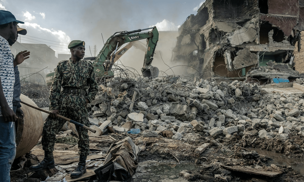A building under demolition in the Mathare informal settlement of Nairobi, Kenya. Photo by LUIS TATO/AFP via Getty Images