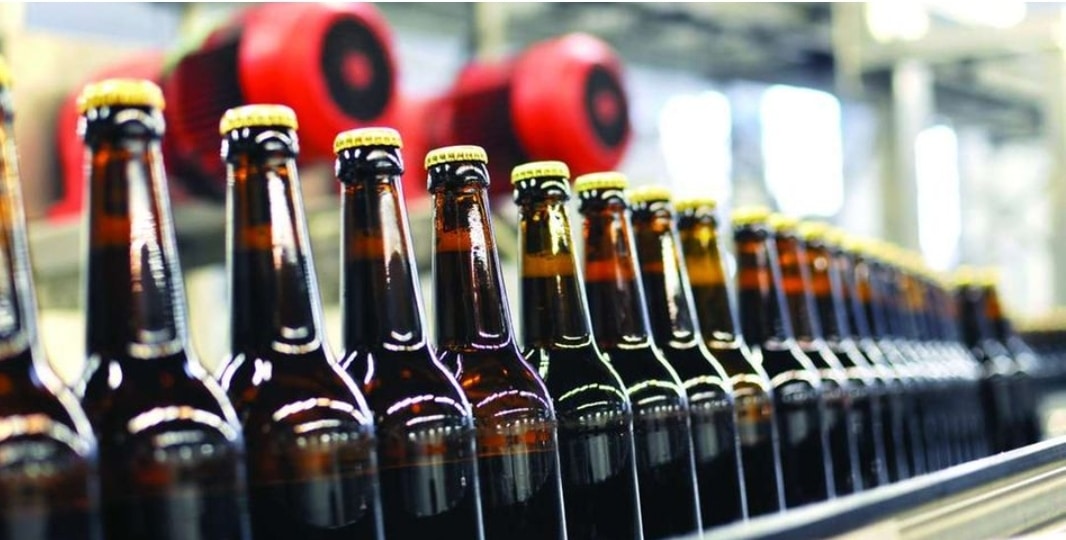 Beer bottles on an assembly line. PHOTO/Courtesy