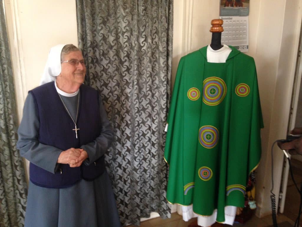 Sister Ida Lagonegro next to one of the Pope's Vetements she made. PHOTO/Courtesy