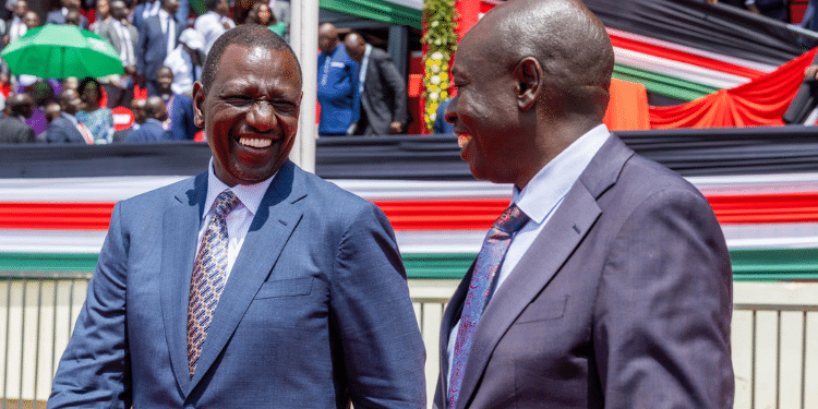President William Ruto (left) and DP Rigathi Gachagua share a light moment during the 61st Madaraka Day celebrations at the Masinde Muliro Stadium in Kanduyi, Bungoma County. PHOTO/PCS