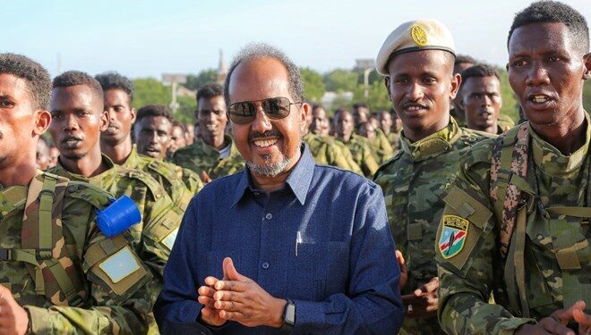 Somali President Hassan Sheikh Mohamud with his country’s troops. PHOTO/Courtesy.
