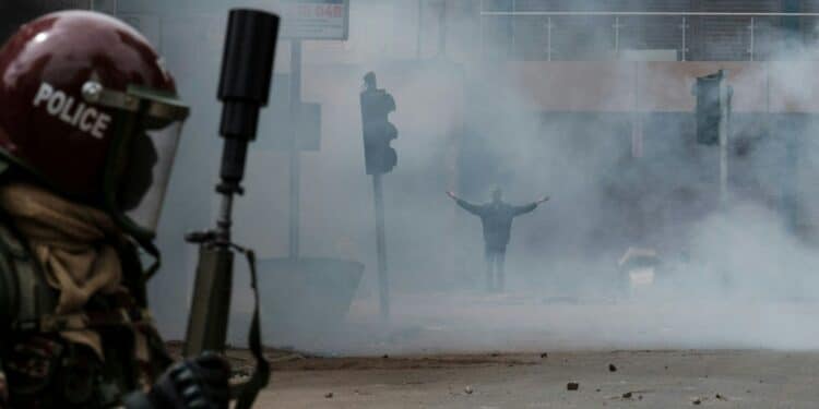 A protester is enveloped in a cloud of tear gas during deadly demonstrations in Kenya on 27 June 2024. Kabir Dhanji/AFP via Getty Images