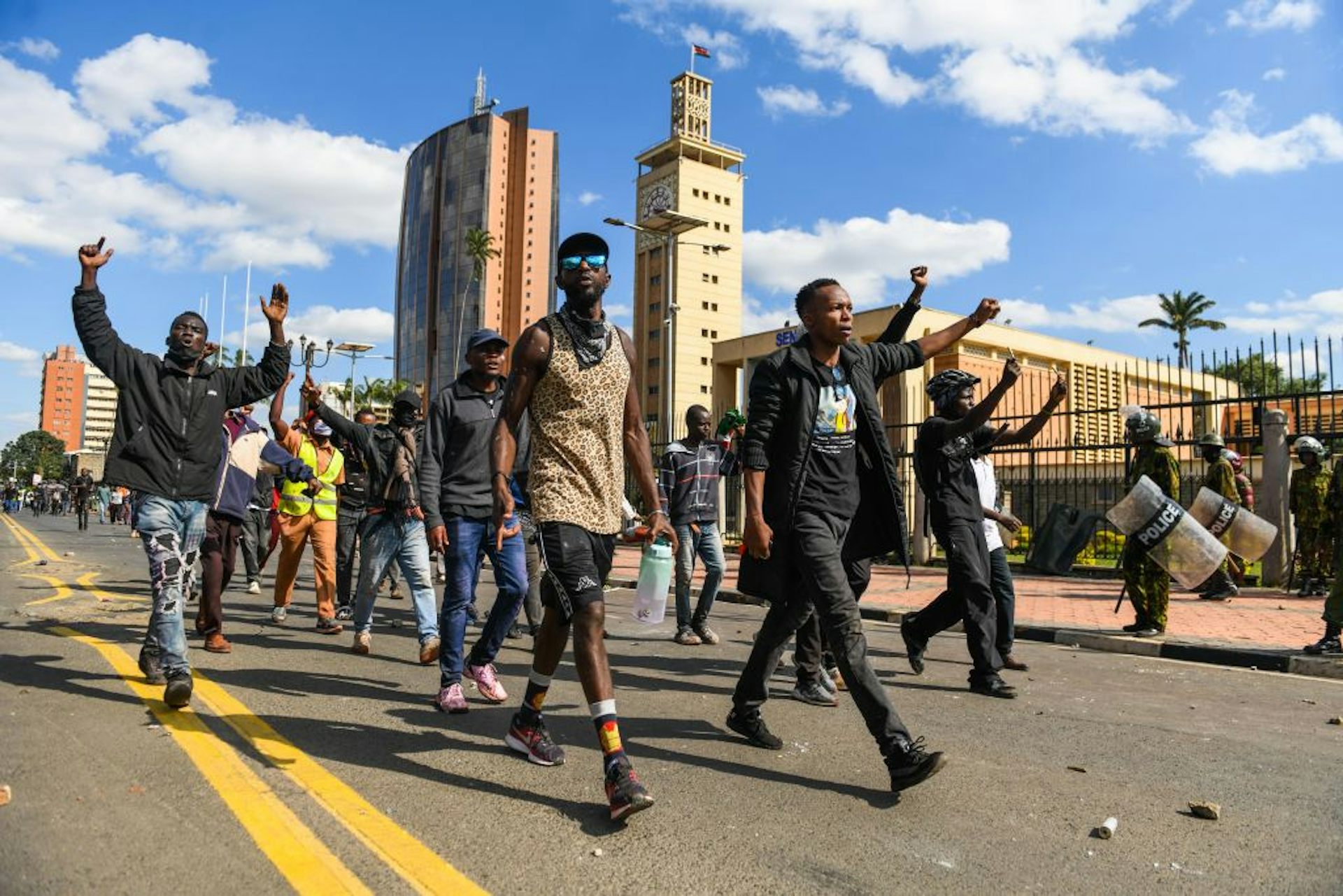 Kenyan police officers face off with anti-tax protesters outside the Kenyan parliament building in Nairobi on 25 June 2024. Photo by Gerald Anderson/Anadolu via Getty Images