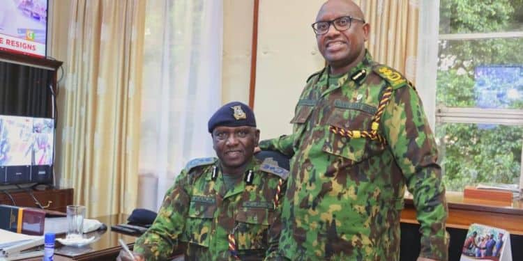 New IG of police Douglas Kanja and former IG Japhet Koome Photo/ Courtesy