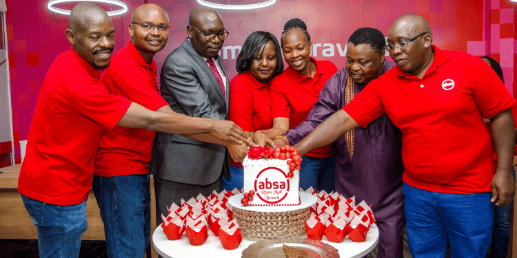 Absa Bank Kenya Customer Experience Manager Benedict Muduvi, Client Relationship Manager Wilson Korir, Regional Manager Julius Songok, Regional Sales Manager Asenath Koome, Business Development Manager Asset Finance Hildah Kiplagat, Deliverance Church Eldoret Associate Pastor Rev. Meshack Madegwa & Rupa Mall Ag. Branch Manager Thomas Chebii cut a cake to celebrate the Bank’s new branch opening at Rupa Mall in Eldoret. Photo/Absa