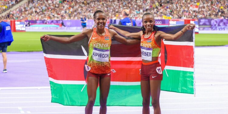 Beatrice Chebet and Faith Kipyegon pose for a photo after the 5000m race at Paris 2024 Olympics. PHOTO/Courtesy.