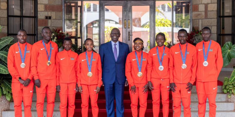 President William Ruto with athletes. Photo/ PCS