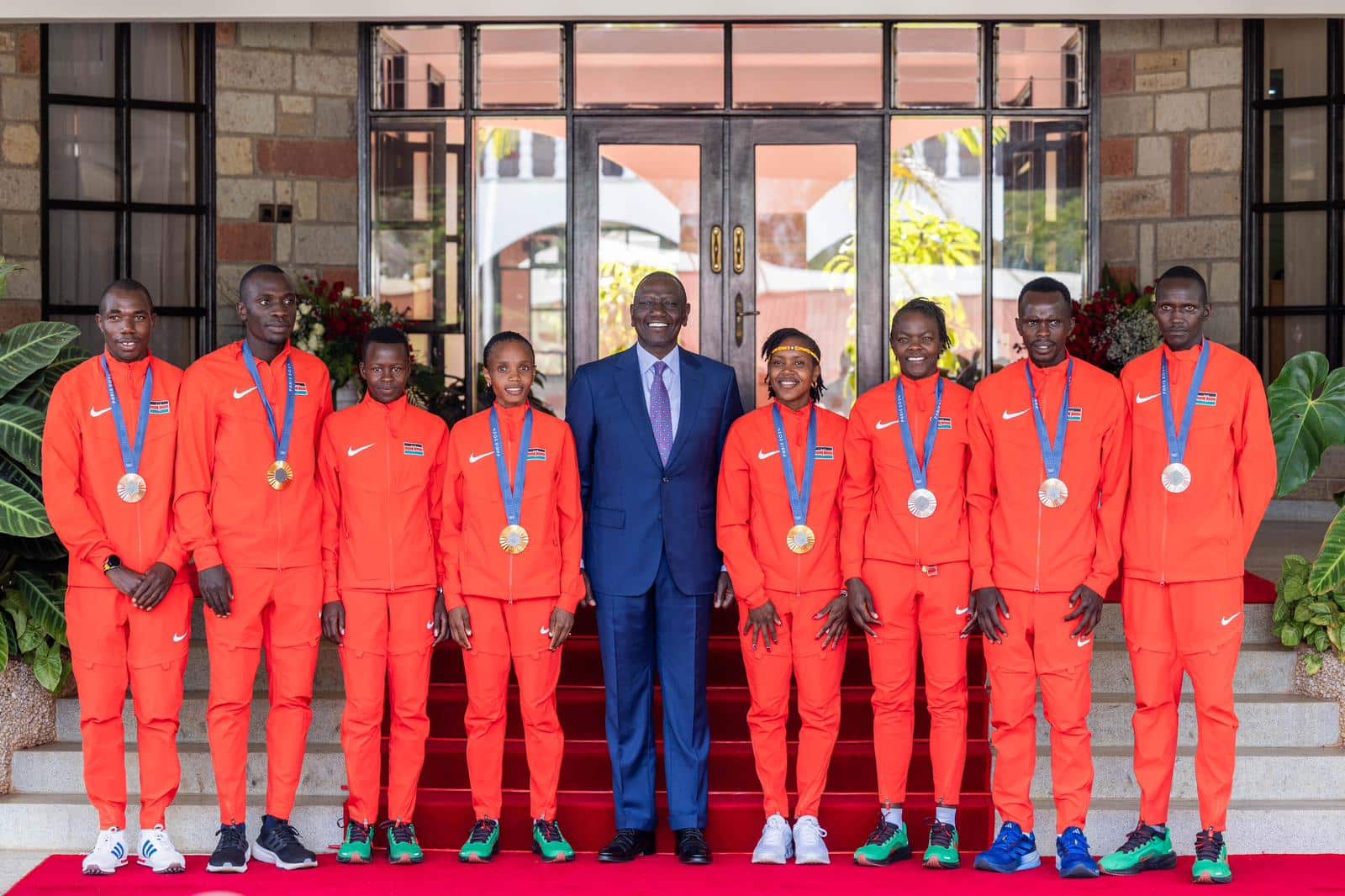 President William Ruto with athletes. Photo/ PCS
