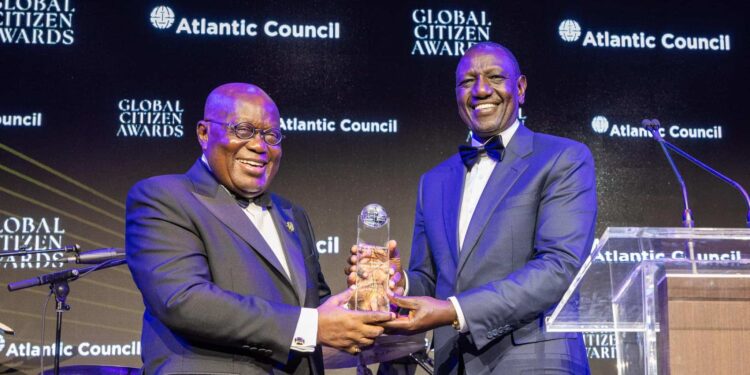 President William Ruto (right) with President of Ghana Nana Akufo-Addo during the Atlantic Council of Global Citizen Awards dinner. PHOTO/PCS.
