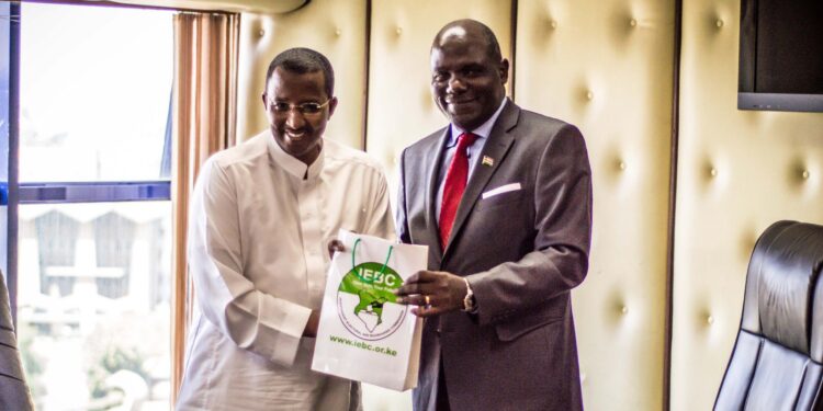 Former IEBC Chairmen Wafula Chebukati (Right) and Issack Hassan. PHOTO/IEBC.