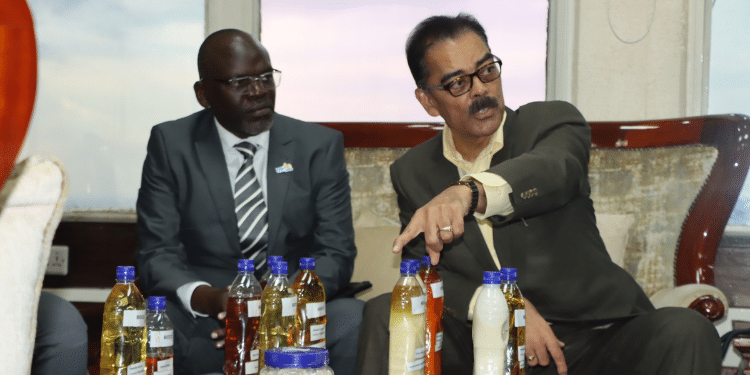 KAM acting CEO Tobias Alando with Vimal Shah Vimal Africa representative from Bidco Group during the meeting. Photo/ KAM