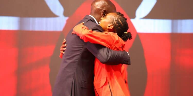 President William Ruto hugs elite athlete Faith Kipyegon during an event at State House. PHOTO/PCS.