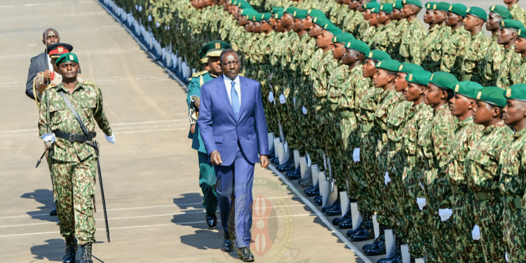President William Ruto inspects a guard of honour mounted by NYS graduates. photo/NYS