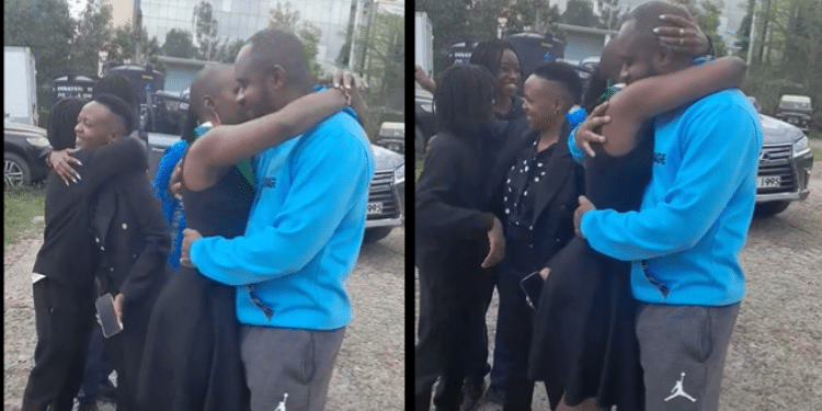 Boniface Mwangi hangs his wife Hellen Njeri after he was released from Kamukunji Police station. PHOTO/ Screengrab. Boniface Mwangi hangs his wife Hellen Njeri after he was released from Kamukunji Police station. PHOTO/ Screengrab.
