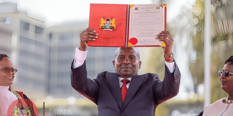 Deputy President Prof Kithure Kindiki displays his swearin in certificate at KICC on November 1, 2024. Looking on is Chief Justice Martha Koome. photos/ Interior Ke