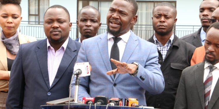 KMPDU Secretary General Dr. Davji Atellah, flanked by other union members and officials, addresses the press on November 27, 2024.