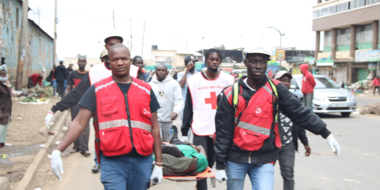 KRCS staff providing critical first aid support and hospital evacuation services through in the Nairobi CBD, in response to the past demonstrations. Photo/ KRCS