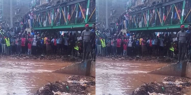 Residents of Mathare watch as a body is discovered along the Mathare RiverResidents of Mathare watch as a body is discovered along the Mathare River
