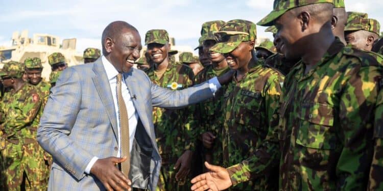 President William Ruto with Kenyan Police Officers in Haiti. PHOTO/PCS