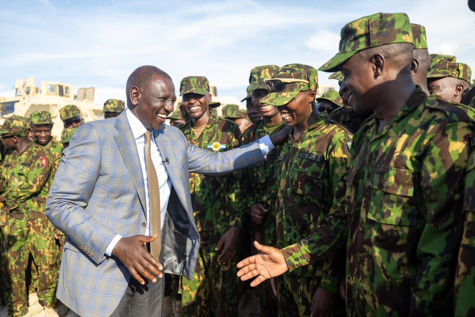 President William Ruto with Kenyan Police Officers in Haiti. PHOTO/PCS