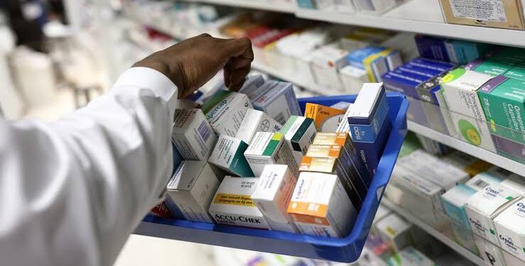 A person shoping for drugs in a drug store. PHOTO/Courtesy