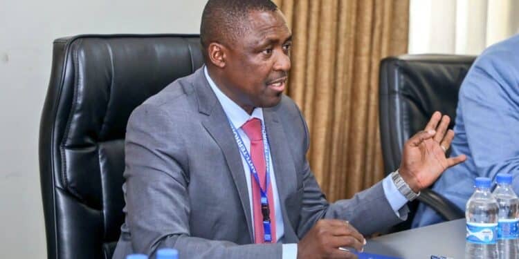 A photo of Saidi Kiprotich chief ATPU at a meeting with US delegates at ATPU headquarters