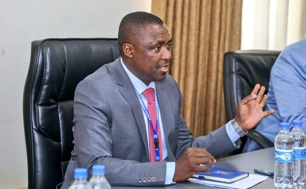 A photo of Saidi Kiprotich chief ATPU at a meeting with US delegates at ATPU headquarters