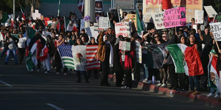 A protest in San Diego against the Trump administration’s mass deportation plan, Jan. 31, 2025. Carlos Moreno/NurPhoto via Getty Images