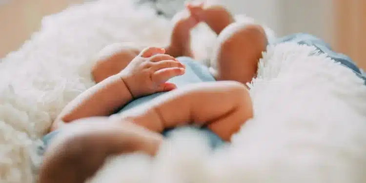 Photo Of Baby Laying On Fleece Blanket. Photo/ Pexels