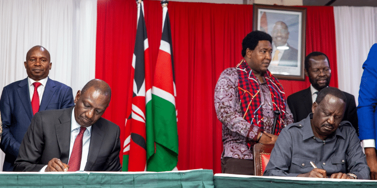 President William Ruto and former Prime Minister sign an MoU of the framework that will guide their cooperation at the KICC on March 7, 2025. Photo/ Kithure Kindiki. Jaoko Oburu Odinga. Salasya