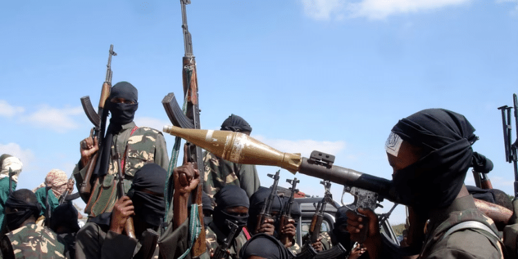 Armed al-Shabab fighters ride on pickup trucks just outside the Somali capital of Mogadishu, Dec. 8, 2008. PHOTO/VOA.
