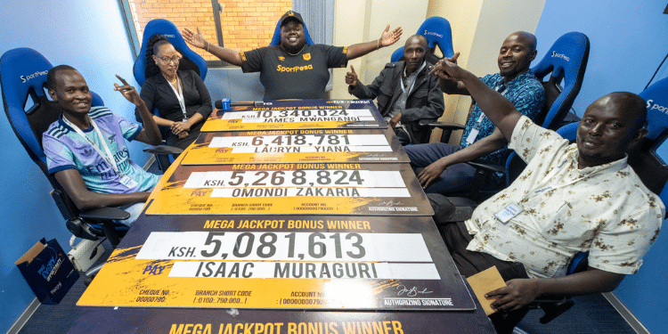 Cheques for recent winners of SportPesa mega jackpot. PHOTO