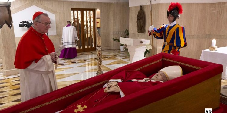 he Vatican releases first images of Pope Francis in a casket
