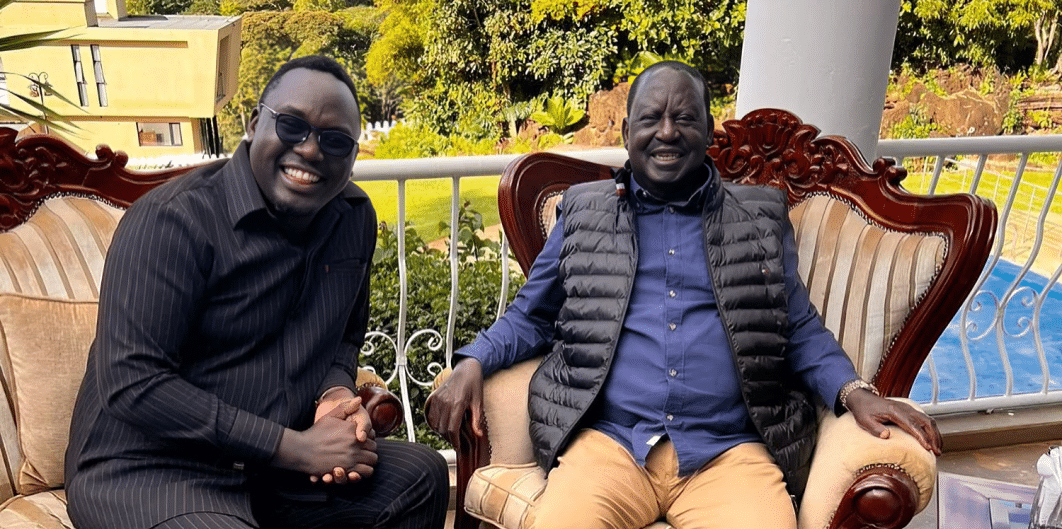 Chairman of Dexis Group of Companies Stephen Ochieng shares a light moment with former Prime Minister Raila Odinga