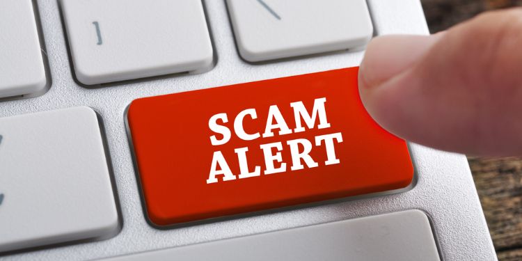 A scam alert warning.