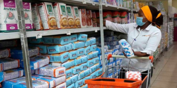 A Lady Picks Wheat Flour At Naivas Supermarket In Nyeri On June 9, 2021. Photo/Nmg