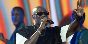 Bien Performing At A Concert