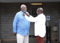 President WIlliam Ruto makes the collar of East African Court of Justice judge Charles Nyachae. Photo/DPP