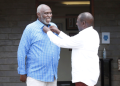 President WIlliam Ruto makes the collar of East African Court of Justice judge Charles Nyachae. Photo/DPP