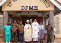 Bishop Of The Military Ordinariate Of Kenya Rt Rev Wallace Ng’ang’a And Lieutenant Colonel (Fr) Duncan Ndegwa Pose For A Photo With Other Officers And Faithfuls At St. Raphael Catholic Chapel On July 29, 2025. Photo/Kdf.