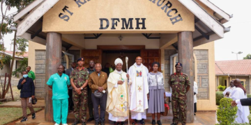 Bishop Of The Military Ordinariate Of Kenya Rt Rev Wallace Ng’ang’a And Lieutenant Colonel (Fr) Duncan Ndegwa Pose For A Photo With Other Officers And Faithfuls At St. Raphael Catholic Chapel On July 29, 2025. Photo/Kdf.