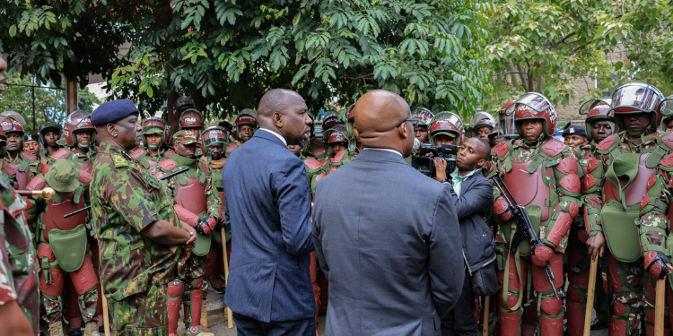 Murkomen Orders Crackdown On Powerful Individuals Smuggling And Selling Guns Interior Cs Kipchumba Murkomen, Ps Raymond Omollo And Ig Douglas Kanja Addressing Police Officers During A Past Meeting. Photo/Murkomen X.