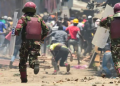 Riot Police Officers Disperse Supporters Of Kenya'S Opposition Azimio La Umoja (Declaration Of Unity) One Kenya Alliance, During Nationwide Protests Over The Cost Of Living And Alleged Fraud During The 2022 Elections, In Mathare Settlement Of Nairobi, March 27, 2023.