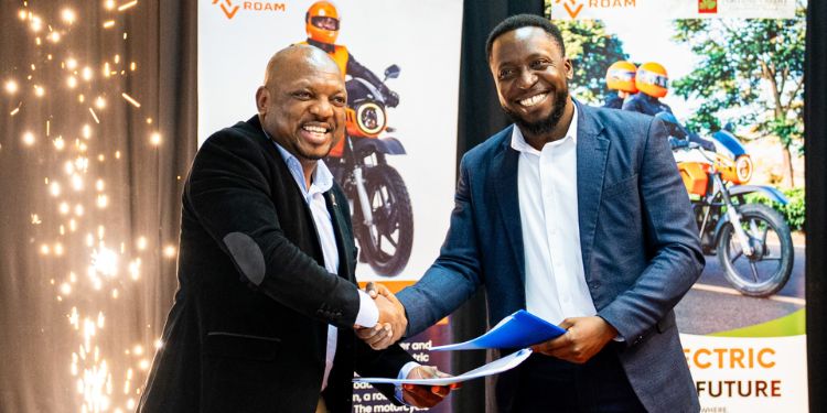 Habib Lukaya, Roam’s Regional Sales Operations Manager and Bernard Mwonyonyo. PHOTO/Roam