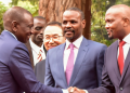 Former Cs Moses Kuria (Right) Shares A Light Moment With President William Ruto At A Past Function.