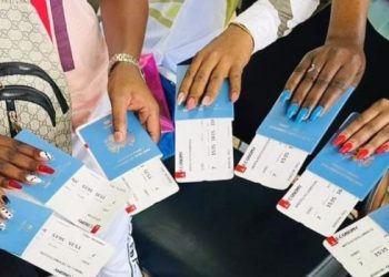 A Photo Of Kenyans Holding Passports.