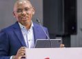Safaricom Ceo Peter Ndegwa Speaking At A Past Company Event.